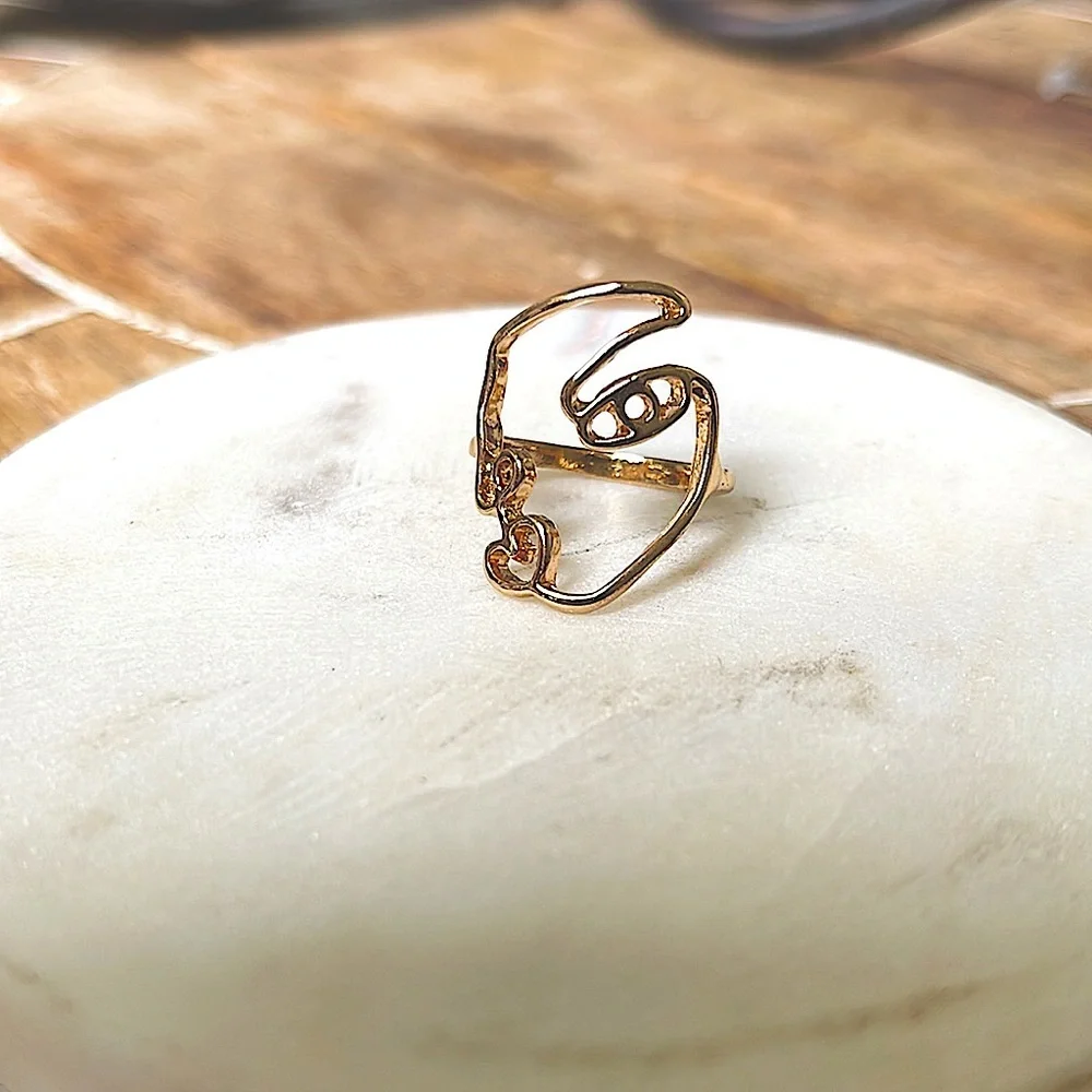 Gold face ring